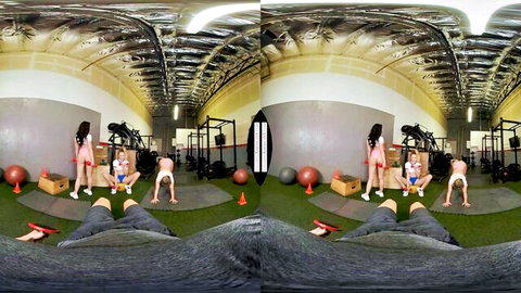 POV of two athletic babes in thongs bending over teasing in gym turf
