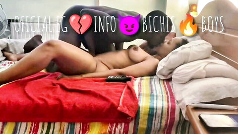 Ebony woman nude on bed with two black men in intimate threesome pose, Balthazar Ebang scene 9