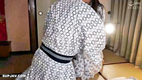 Curvy Japanese brunette in kimono bends over showing big ass in tatami room