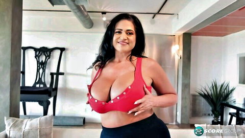 Kailani Kai in red tank top showcasing massive cleavage, toy show tease