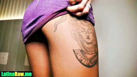 Brazilian black Latina with braids and thigh tattoos teasing in purple dress