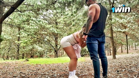 Curvy Latina with huge ass in tiny shorts bent over outdoors, teased by muscular man