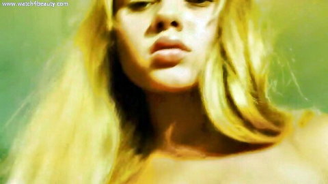 Seductive blonde angel closeup in Watch 4 Beauty nude video, alluring gaze