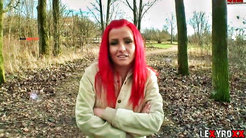 LexyRoxx redhead in forest, arms crossed outdoor tease, 35 chars