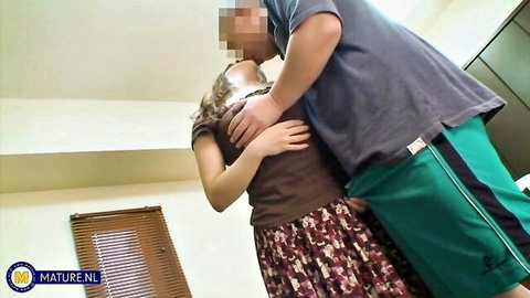 Yumi Kajiyama passionately kissing partner in steamy embrace