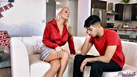Blonde MILF stepmom in red satin blouse with big tits seduces stepson on Valentine's couch