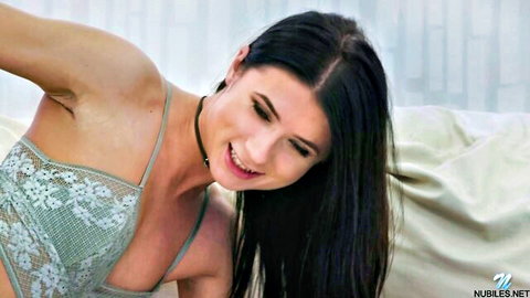 Nicole Black petite European in lace lingerie smiling seductively