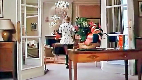 Retro blonde in polka dot dress, teasing solo scene from vintage porn