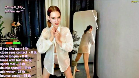 Jennifer Shy redhead in sheer white blouse teasing solo in mirror