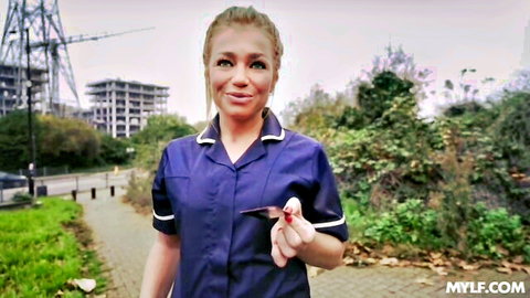 Jessica Jenkins as sexy blonde nurse in POV tease, smiling outdoors