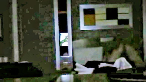 Blurry Asian couple in intimate office adultery scene, woman in black lingerie on couch