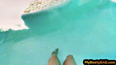 Ebony beauty with big booty and boobs teases in outdoor pool