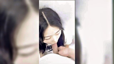 Cute Korean girl in Nike top giving handjob, close-up Asian amateur porn thumbnail