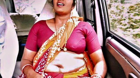 Indian MILF in revealing saree with huge breasts and exposed midriff in steamy van scene