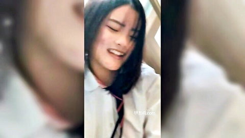Korean amateur woman in white shirt with ecstatic expression in car