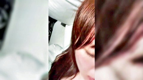Blurry close-up of seductive Korean woman with long red hair, eyes closed, soft lighting