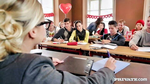Ferrara Gomez as blonde teacher in glasses with students in classroom threesome setup