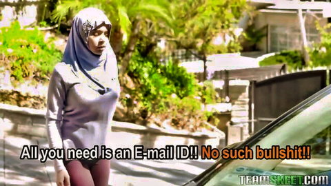Aaliyah Hadid in hijab and tight leggings posing seductively outdoors