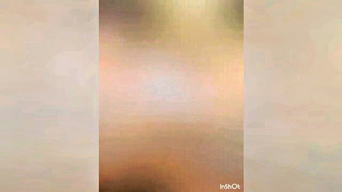 Blurry amateur homemade video stills showing vague skin tones in yellow lighting