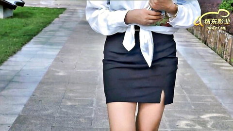 Anna in tied white blouse and short black skirt, outdoor tease