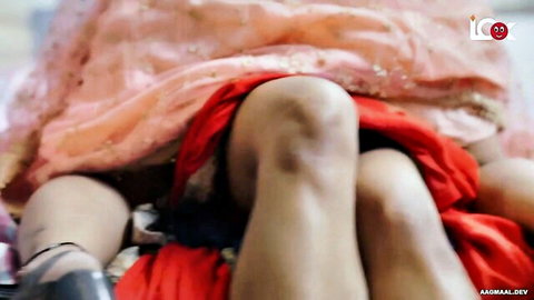 Intimate Indian lesbians in colorful sarees, emotional embrace