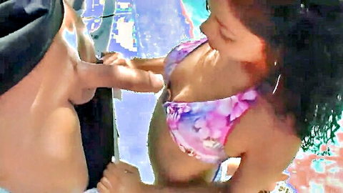 Curvy tanned Latina in floral bikini gets big tits groped by man poolside
