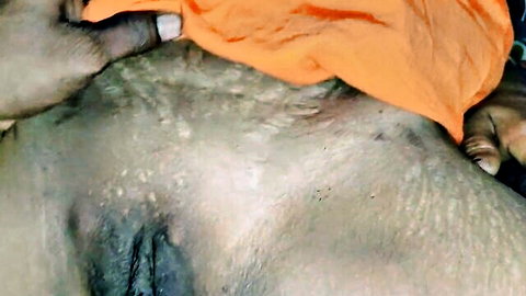 Indian bhabhi's hairy pussy being cleaned by dever's hand