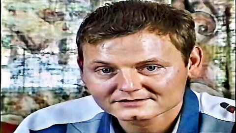 Vintage mature man in casual shirt, intense gaze, old-school porn vibe