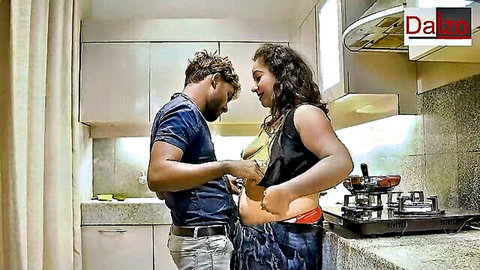 Indian stepmom in black tank top and red panties teases stepson with big ass in kitchen