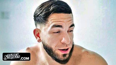 Shirtless young Latino stud with beard smirks in cheating aunty sex scene
