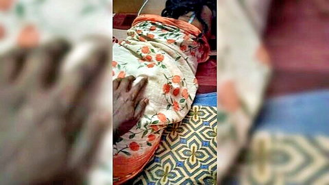 Indian mature woman in body massage at lodge, sensual touch under sheet