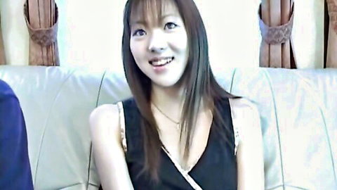 Smiling Asian woman in low-cut black spaghetti strap top, JAV thumbnail BKSD-001