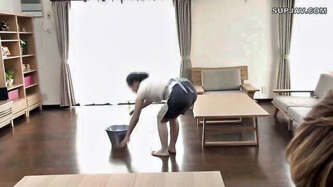 Japanese MILF bends over mopping floor in upskirt view exposing curvy big ass