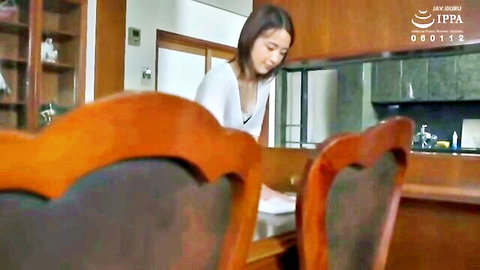 Ai Mukai bending over in white top, seductive kitchen pose from New Intruder JAV