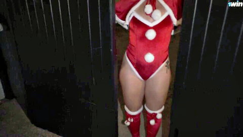 Diana Wellness in sexy Santa costume, topless with muscular man in steamy encounter
