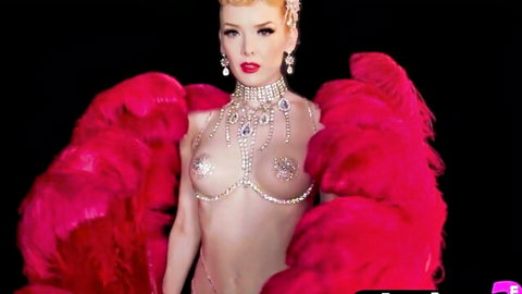 Calypso Muse, petite Latina with big tits, in red feather boa and diamond pasties for Playboy