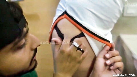Indian man fingers shaved pussy of South Asian woman in pulled-aside white shorts