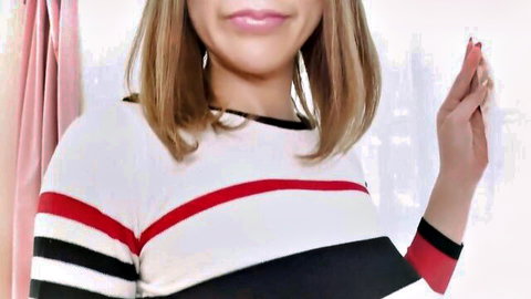 Seductive fair-skinned Asian babe in striped top teasing with hand near glossy pink lips