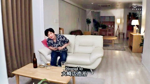Hinano Osawa as married woman lounging relaxed on sofa in casual shirt and jeans