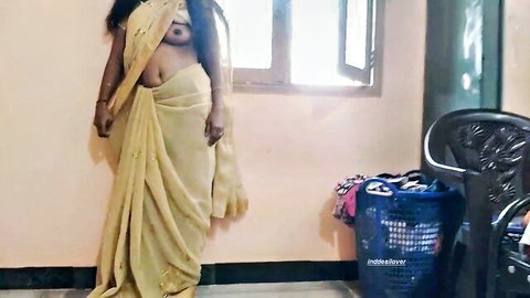 Desi bhabhi topless in sheer yellow saree, exposing breasts