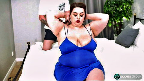 Julia Lane plump BBW in blue dress teased by man on bed