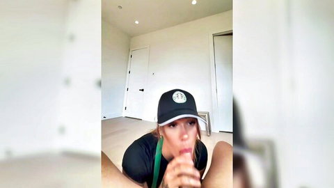 Arikytsya seductively posing in black cap and top, teasing expression