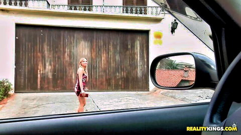Lovely Haze in short dress posing outside garage, car view tease