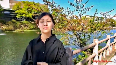 18yo boyish Japanese virgin girl posing outdoors by river in black shirt