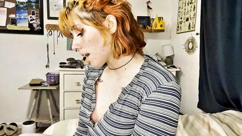 Freckled redhead in open striped shirt teasing cleavage for JOI