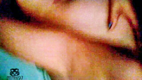 Blurry close-up of amateur woman's neck and shoulder in teal top