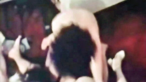 Vintage couple in explicit doggy style sex, woman with black hair bent over nude