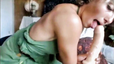 Short-haired amateur babe dildos her ass in green dress on webcam