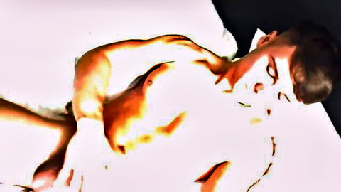 Muscular jock nude with erection, lying sideways