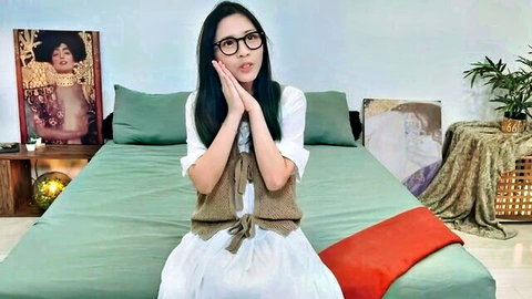 Surprised Asian woman in glasses and white dress, gangbang video preview